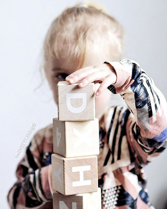 Girl building a block tower